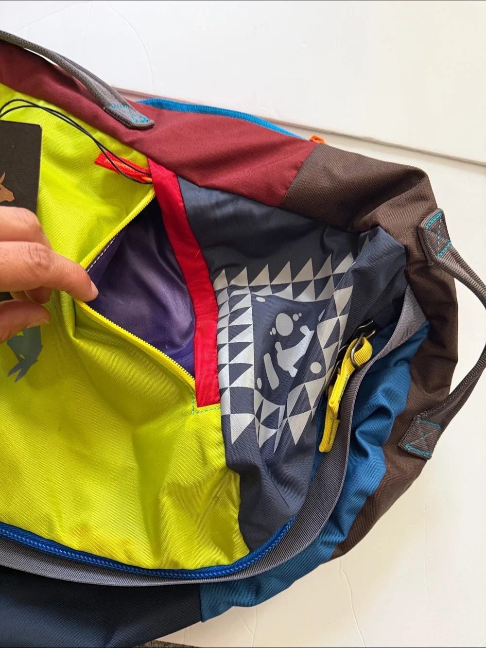 the Cotopaxi Uyuni 46L Duffel Bag (Del Día Edition).